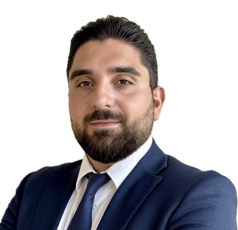 Michel Habchy in a navy suit